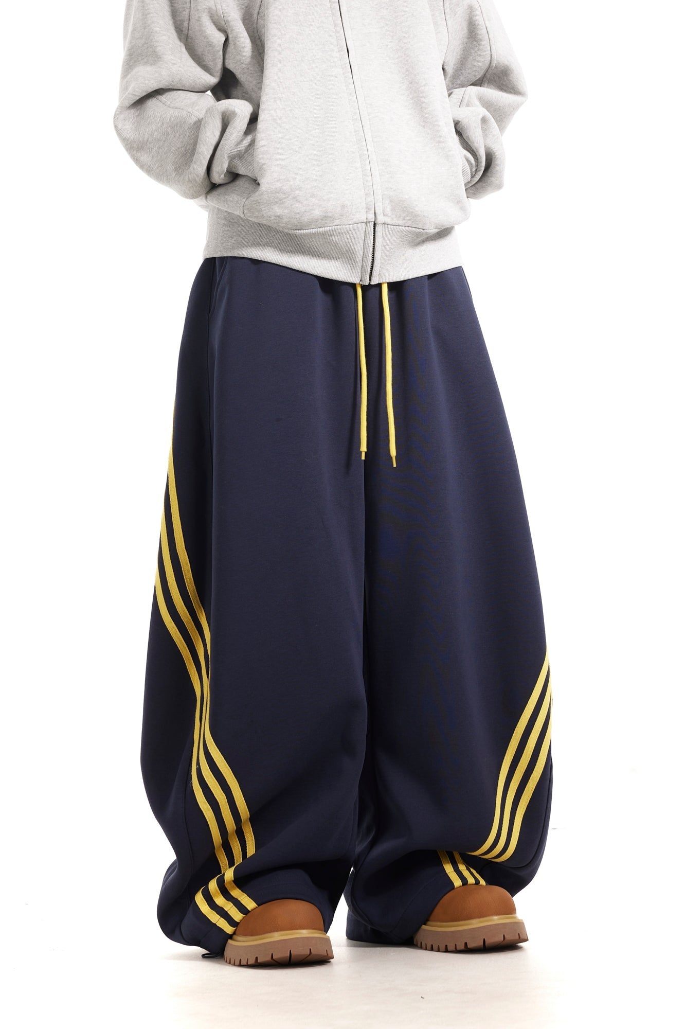 11KN x BTSG three-bar striped draped scimitar sweatpants