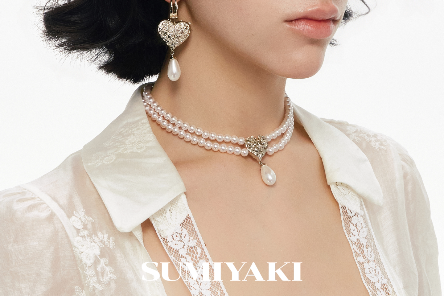 SUMIYAKI Relief Love Angel Pearl Earrings