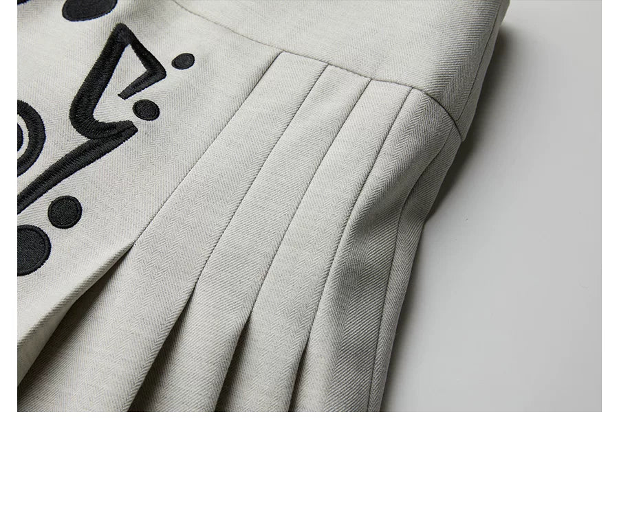 INDULGE Embroidered Pleated Skirt