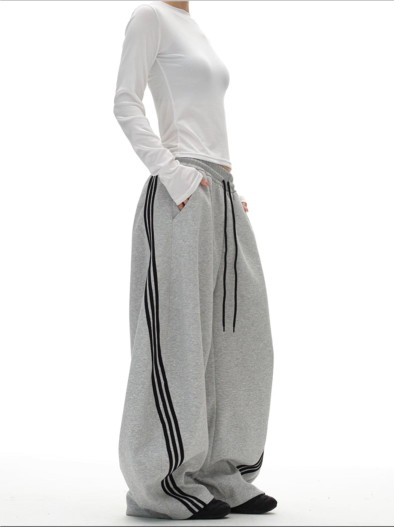 11KN x BTSG three-bar striped draped scimitar sweatpants