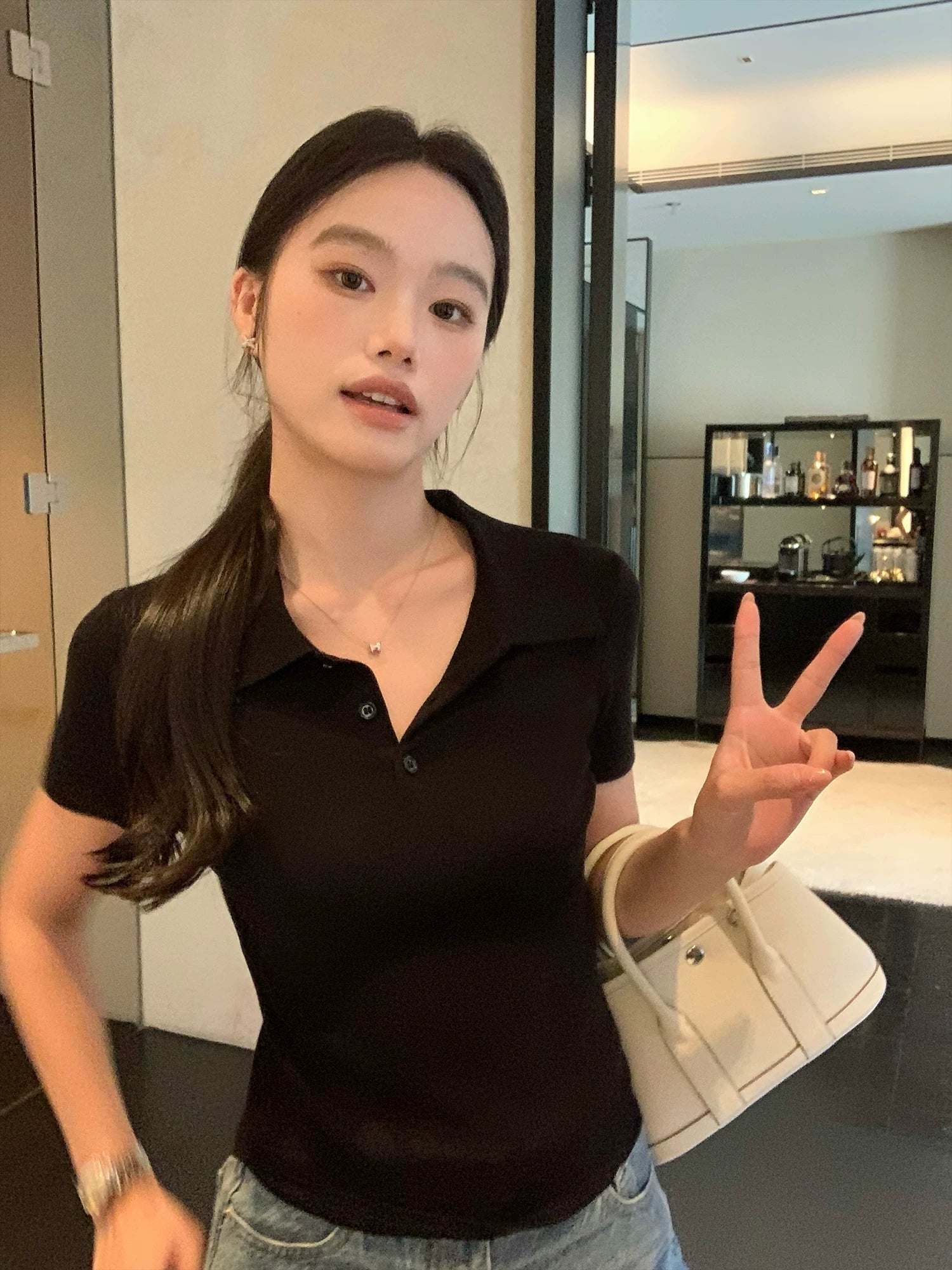 pusumede Cropped Notch-Lapel Knit Polo