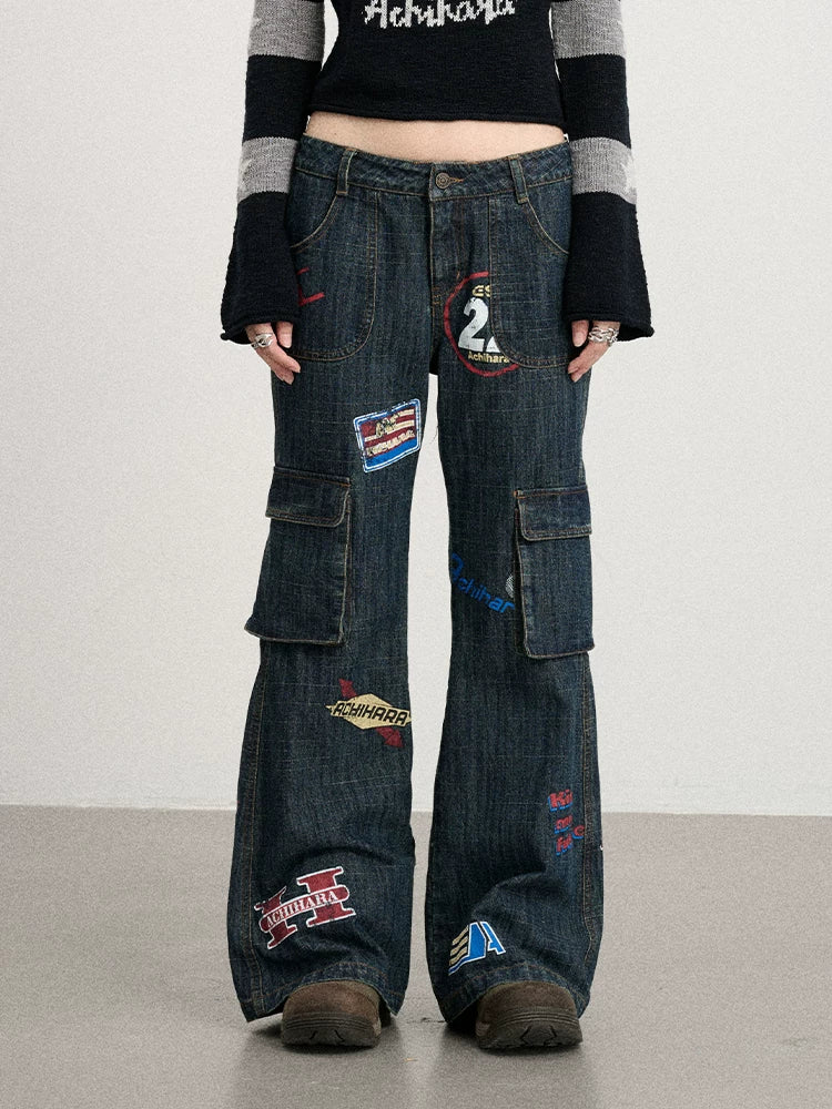 Achihara Stamp Flared Distressed Low-Rise Jeans