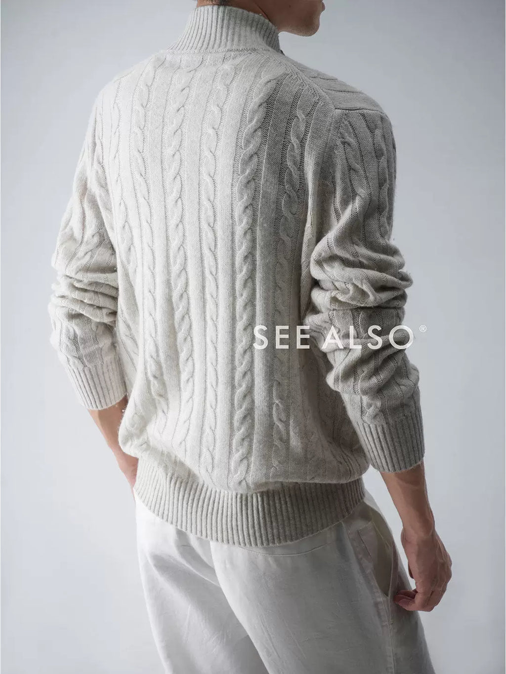 SEE ALSO Cable-Knit Half-Zip Loose Fit Sweater
