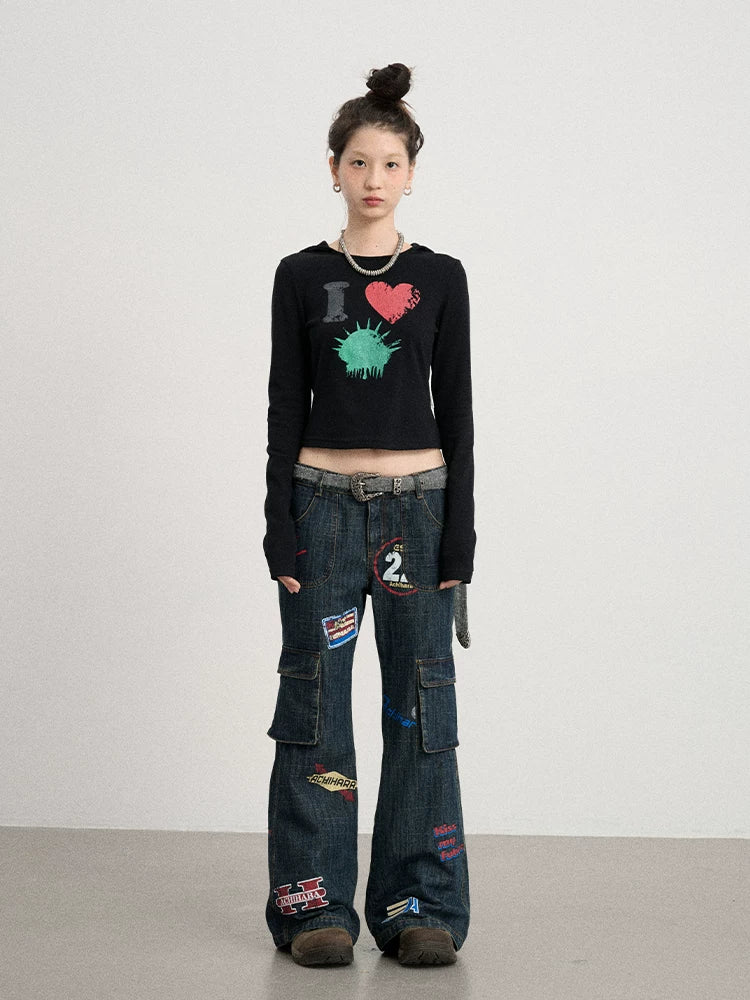 Achihara Stamp Flared Distressed Low-Rise Jeans