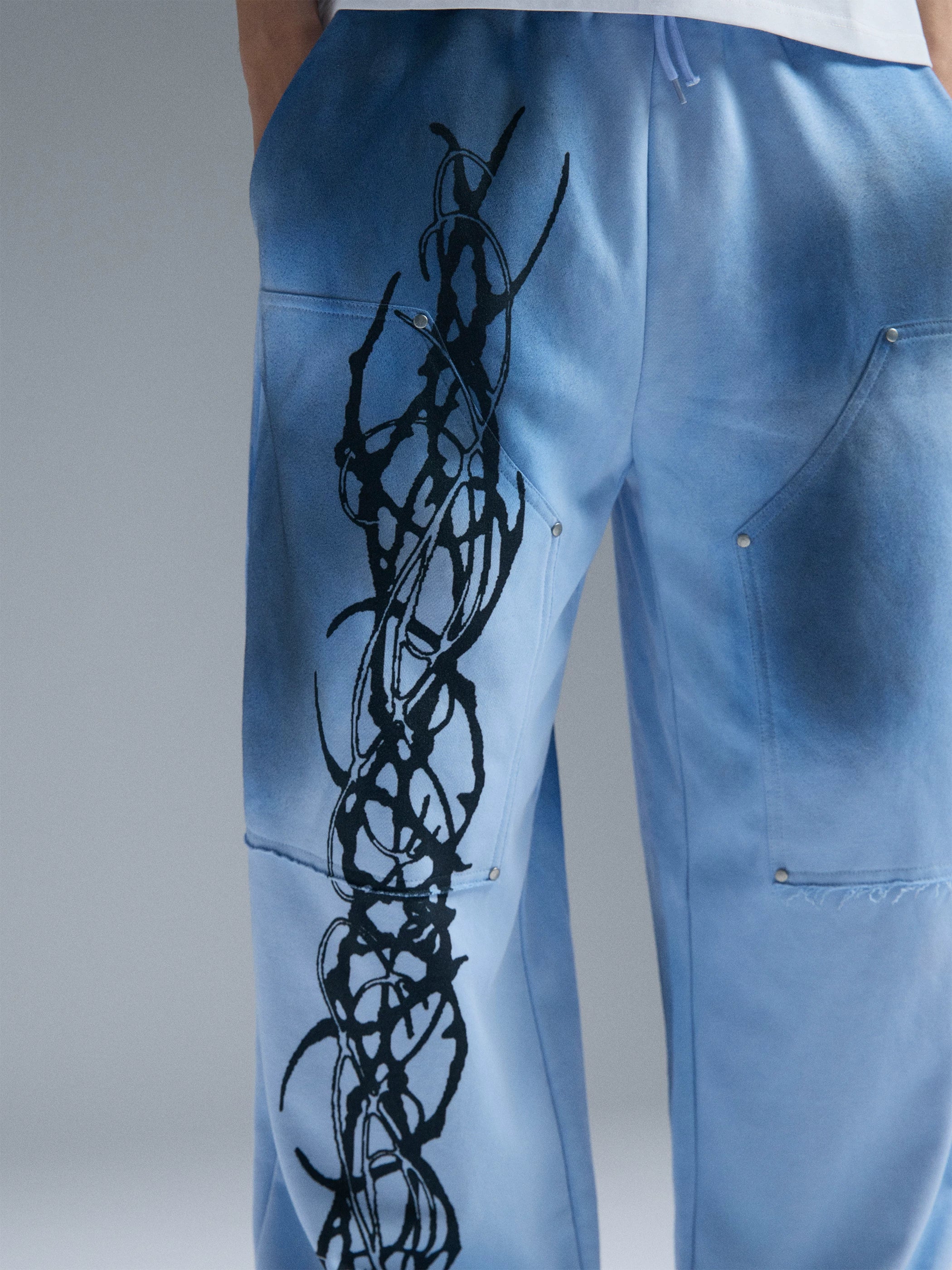 PAIKI Thorn Ink Splatter Baggy Sweatpants