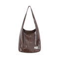 CryingCenter Crack Glossy Oil Wax Crossbody Bag
